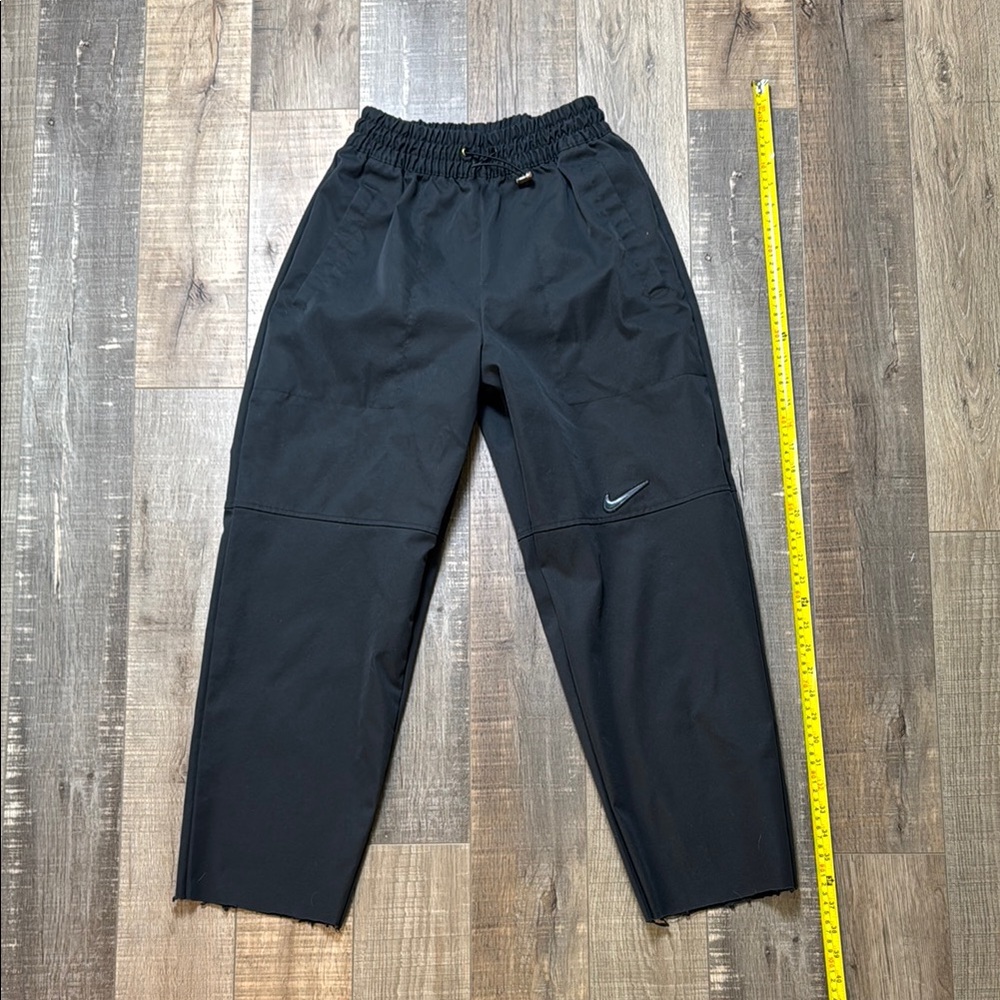 Woman’s Black Nike Track Pants